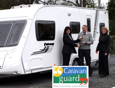 Mr Moore picks up the keys for his new caravan