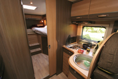 Rapido 666 motorhome looking rear kitchen