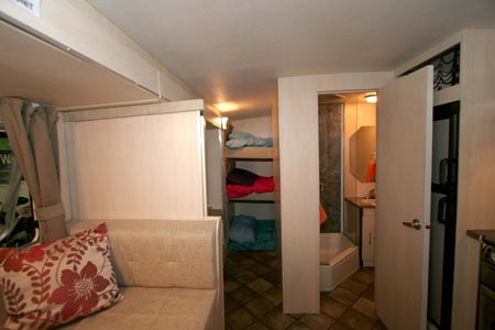 Rear triple bunks and bathroom