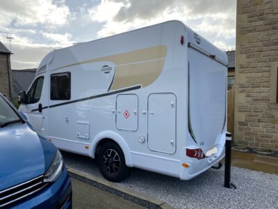 Motorhome with locked post storage