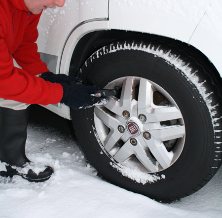 Checking tyre pressures and inspecting for damage