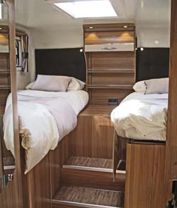 The Autograph 750 has two fixed single beds over the garage