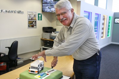 Brownhills and Caravan Guard customer Mt Strutt cuts 15 year celebration cake