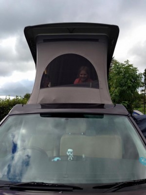 Emily in a campervan at Knight Stainforth