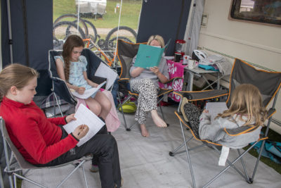 family in an awning