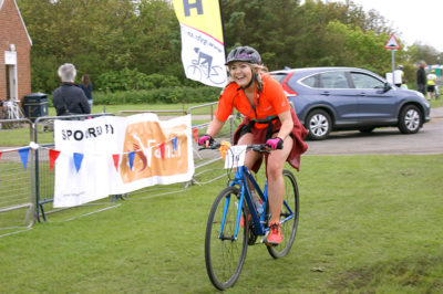 Caravan Guard's Rebecca crosses the Great Yorkshire Bike Ride finish line