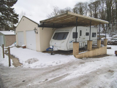 touring caravan snow winter carport