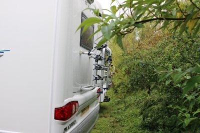 Beware of trees and bushes behind your motorhome