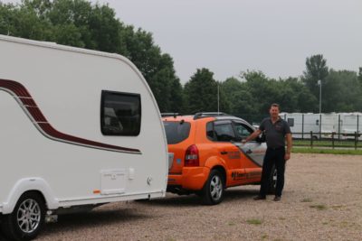 Seek professional assistance when reversing a caravan