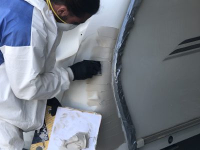 repairing a damaged caravan