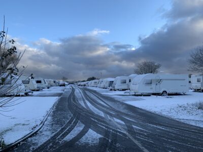 caravans on snowy pitch