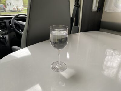 level motorhome with glass of water